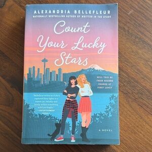 Avon 'Count Your Lucky Stars' Book Cover with Blue and Orange